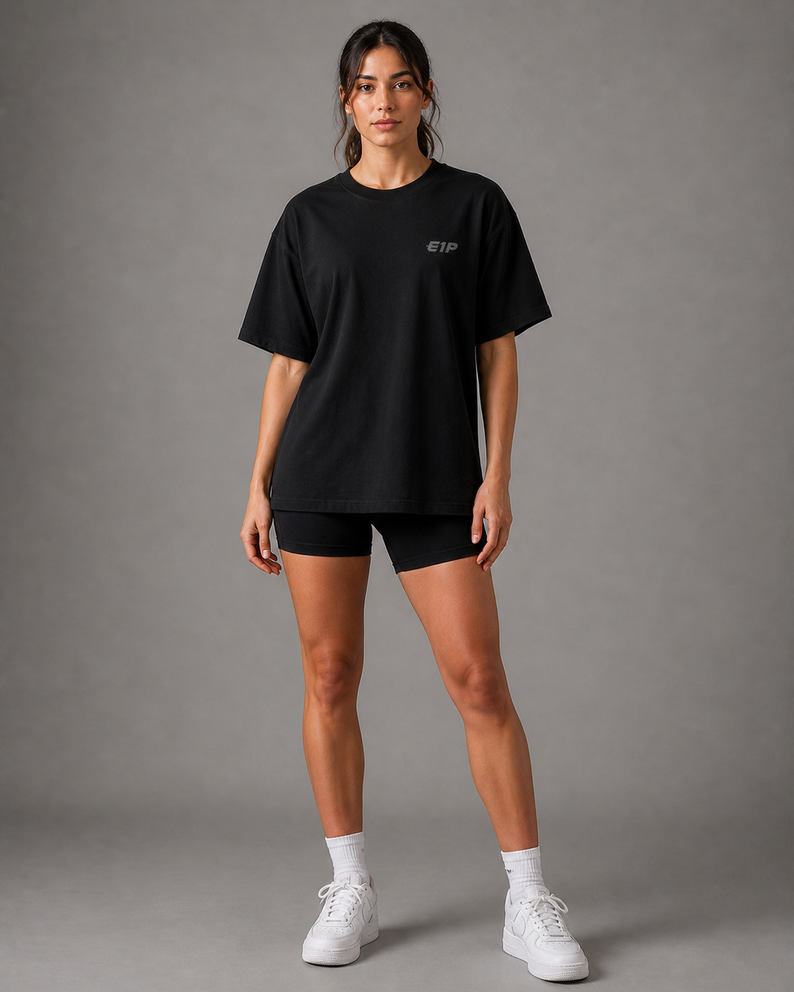 E1P Built Different Tee Black - Front Female